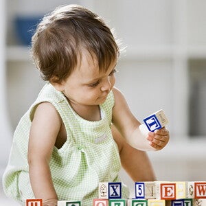 Baby girl playing with cubes Baby girl playing with cubes