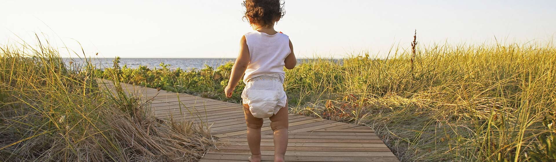 Baby walking to the beach Baby walking to the beach