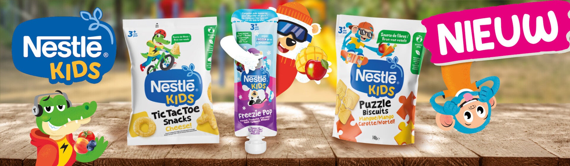 Nestlé Kids verpakkingen en logo met kleurrijke speeltuin op de achtergrond.