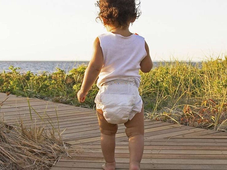 Baby walking to the beach Baby walking to the beach